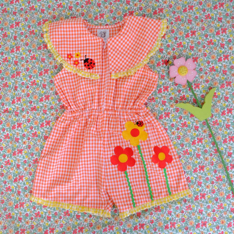 Nutkin Story Bowie Playsuit Orange